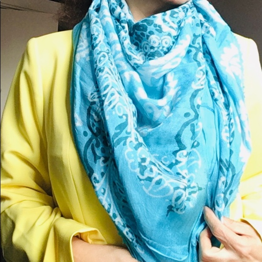 Light blue scarf with white flower